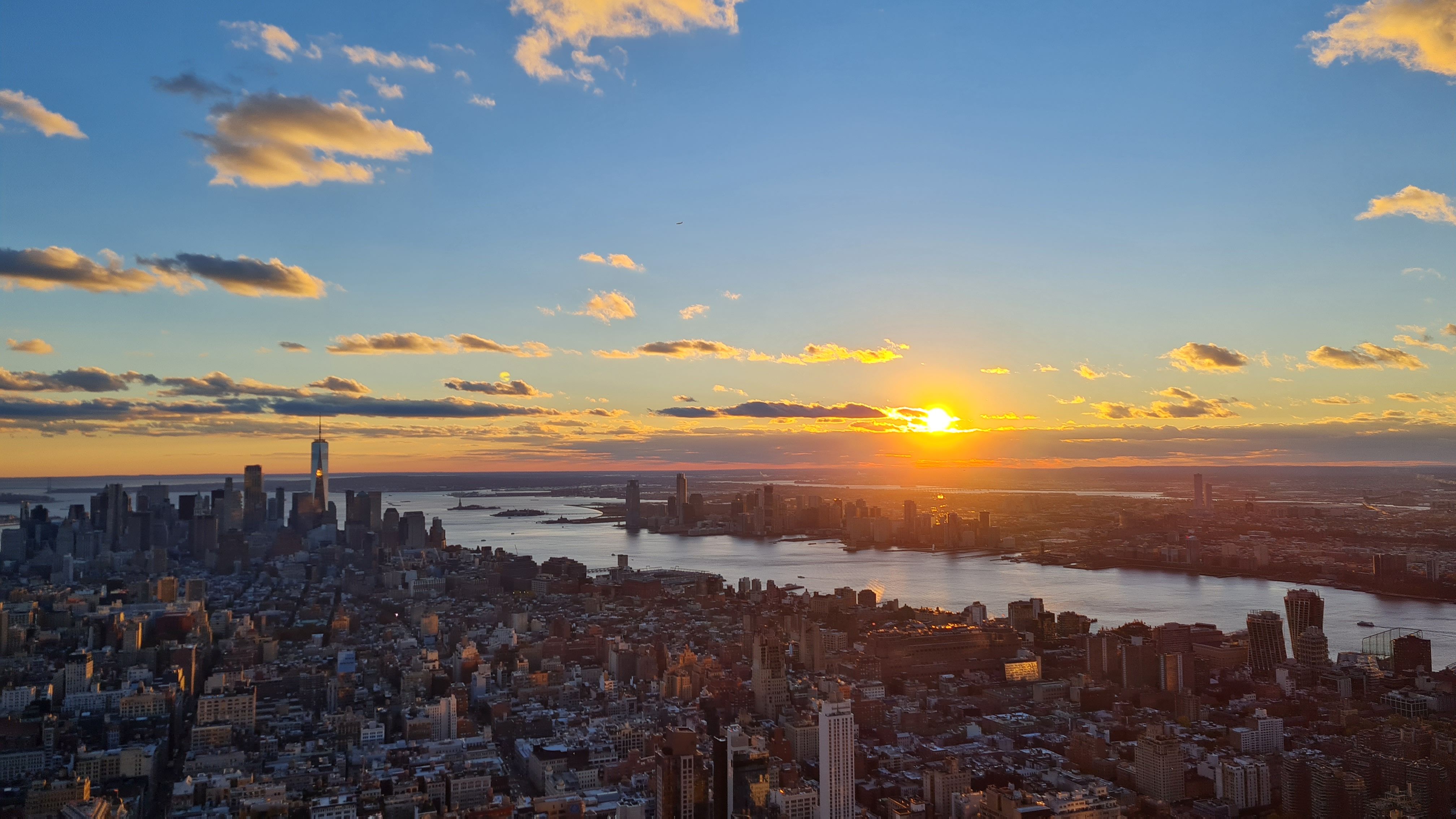 Sunset over the Manhattan skyline and Hudson River, seen from the Empire State Building